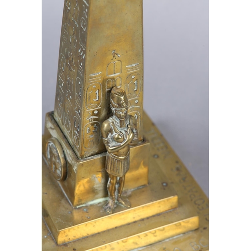 29 - A VICTORIAN BRASS LAMP BASE FORMED AS CLEOPATRA'S NEEDLE bearing inscription to stepped base, ‘CLEOP... 