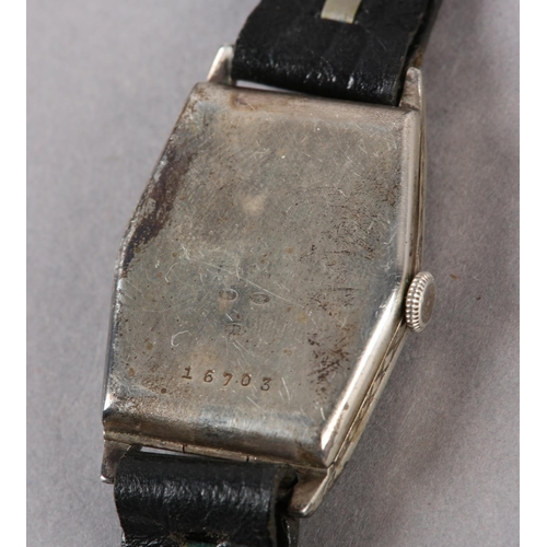 251 - A GENTLEMAN'S ART DECO DRESS WRISTWATCH c1930 in lozenge shaped silver hinged v-case no 16703 with s... 