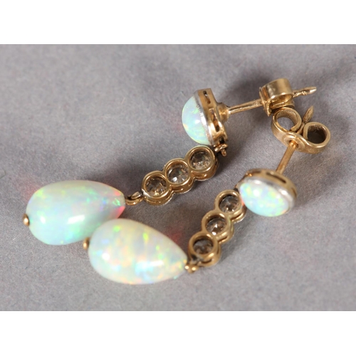 236 - A PAIR OF GEORGE V OPAL AND DIAMOND EAR PENDANTS in 15ct gold, each set with a pear shaped cabochon ... 