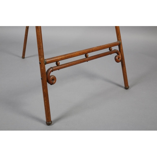 416 - A SECESSIONIST MOVEMENT ELM SALON EASEL, with curled finials, fanned bobbin panel and scrolled metal... 