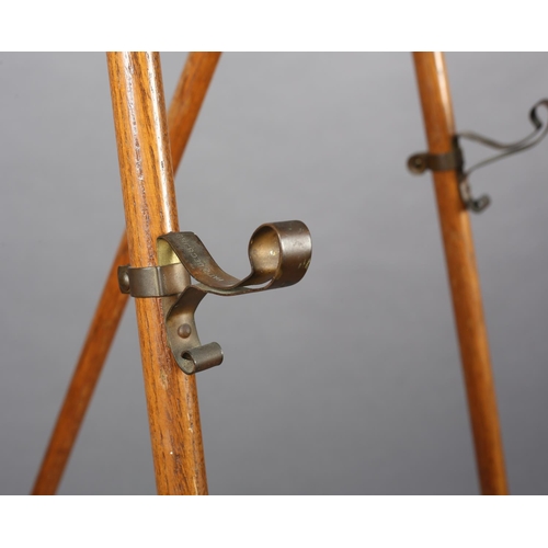 416 - A SECESSIONIST MOVEMENT ELM SALON EASEL, with curled finials, fanned bobbin panel and scrolled metal... 