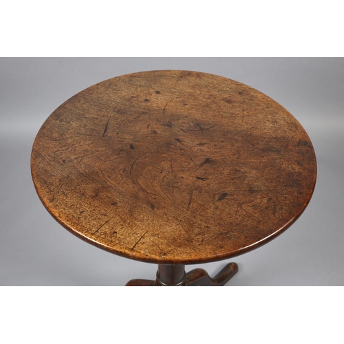 382 - A GEORGE III MAHOGANY TRIPOD TABLE, circular, on a tapered cannon turned pedestal and on cabriole le... 