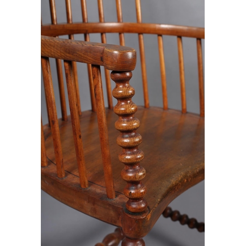 423 - A LATE VICTORIAN ELM AND FRUITWOOD HIGH RAIL BACK ARMCHAIR, broad seat, on bobbin turned legs and st... 