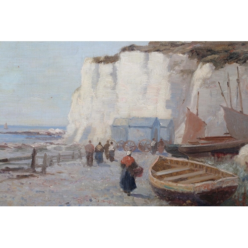 291 - RICHARD WANE RBA (1852-1904), Kentish shoreline with figures, beached fishing boats and bathing huts... 