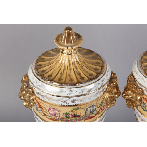 109 - A PAIR OF PEDESTAL VASES AND COVERS of urn form, fluted covers with knopped finials above twin lion ... 