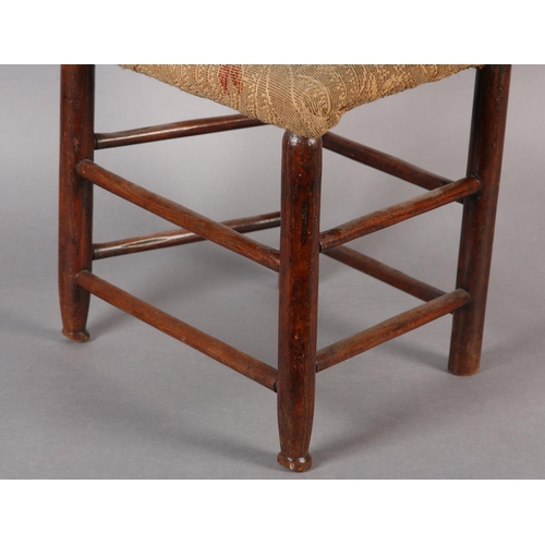 422 - A CHILD'S EARLY 19TH CENTURY ELM RAIL BACK SINGLE CHAIR, upholstered seat, on turned framing, with t... 