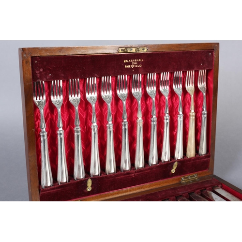 147 - AN EARLY 20TH CENTURY MAHOGANY CANTEEN OF TWELVE ENTRÉE KNIVES AND FORKS, by Walker & Hall, beaded h... 