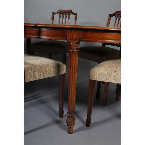 410 - A TITCHMARCH & GOODWIN MAHOGANY DINING SUITE, comprising an oval table on fluted and leaf capped leg... 