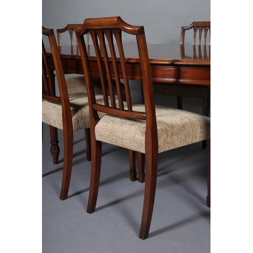 410 - A TITCHMARCH & GOODWIN MAHOGANY DINING SUITE, comprising an oval table on fluted and leaf capped leg... 