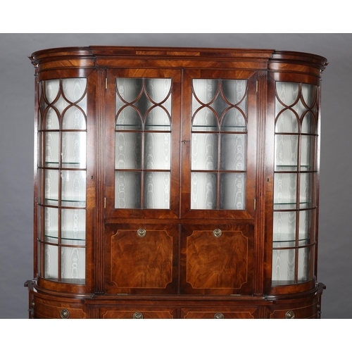 411 - A TITCHMARCH & GOODWIN MAHOGANY DISPLAY CABINET OF 'D' SHAPE having a moulded cornice above two trac... 