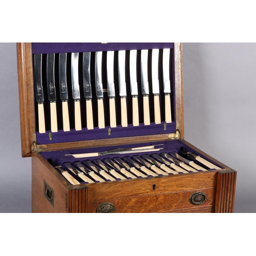 149 - AN OAK CANTEEN OF SILVER PLATED CUTLERY BY PHILLIP ASHBERRY of Sheffield, for twelve settings, in th... 