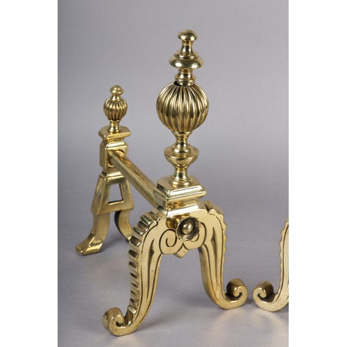 51 - A PAIR OF VICTORIAN BRASS FIREDOGS, each having a reeded ball and baluster upright, on frilled and s... 