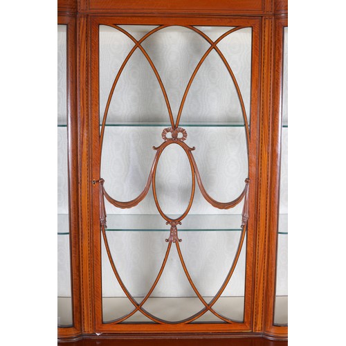 367 - EDWARD VII MAHOGANY INVERTED BREAKFRONT DISPLAY CABINET having moulded cornice over a deep frieze, a... 