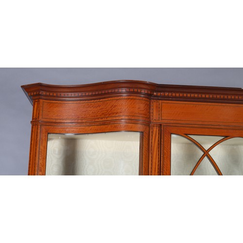 367 - EDWARD VII MAHOGANY INVERTED BREAKFRONT DISPLAY CABINET having moulded cornice over a deep frieze, a... 