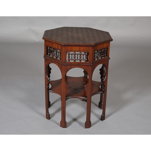 418 - A LATE 19TH CENTURY MAHOGANY MOORISH TABLE OF OCTAGONAL OUTLINE, the surface carved with a repeat ge... 