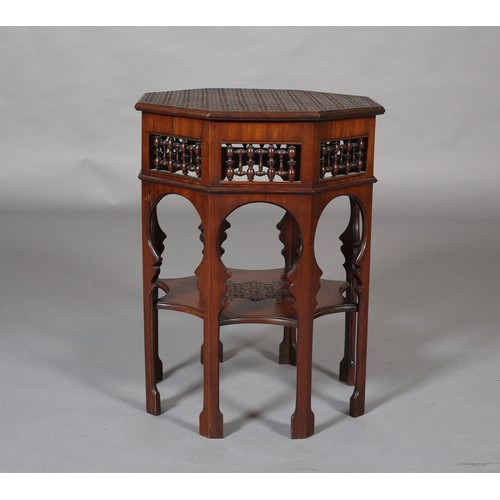 418 - A LATE 19TH CENTURY MAHOGANY MOORISH TABLE OF OCTAGONAL OUTLINE, the surface carved with a repeat ge... 