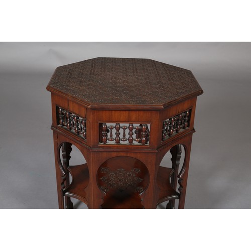 418 - A LATE 19TH CENTURY MAHOGANY MOORISH TABLE OF OCTAGONAL OUTLINE, the surface carved with a repeat ge... 