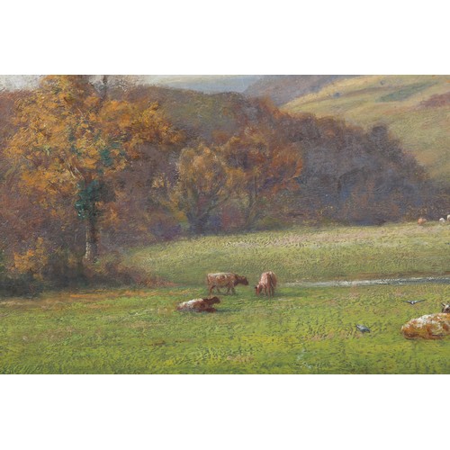 299 - ARTHUR BLACKBURN (1853-1925) Cattle resting in a meadow, hills beyond, oil on board, signed to lower... 