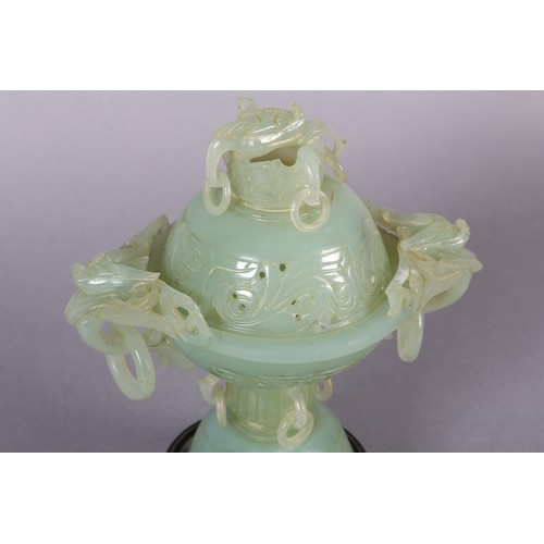 122 - A CHINESE CARVED HARDSTONE INCENSE BURNER AND COVER OF MID TO PALE GREEN COLOUR, the domed cover wit... 