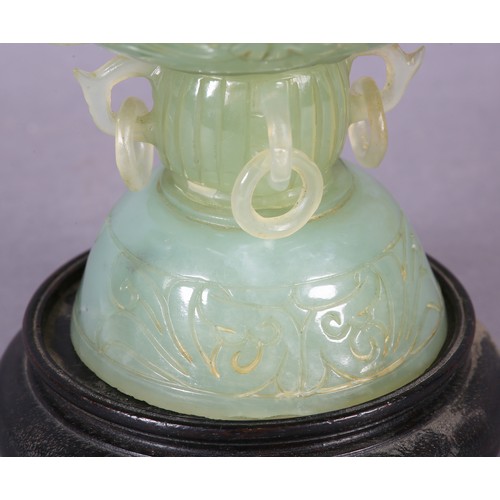 122 - A CHINESE CARVED HARDSTONE INCENSE BURNER AND COVER OF MID TO PALE GREEN COLOUR, the domed cover wit... 