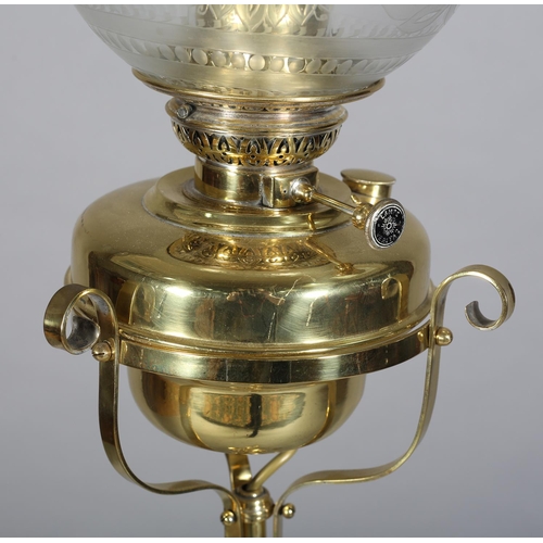 31B - A LATE 19TH CENTURY BRASS STANDARD OIL LAMP, on a centre column and three part barley-twist supports... 