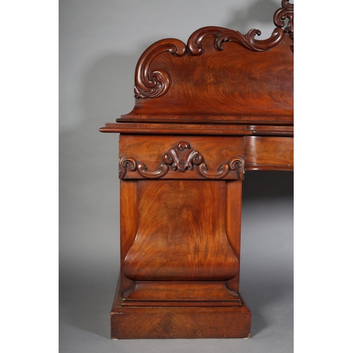 409 - A VICTORIAN FIGURED MAHOGANY PEDESTAL SIDEBOARD, the raised back with carved shell foliate and C-scr... 