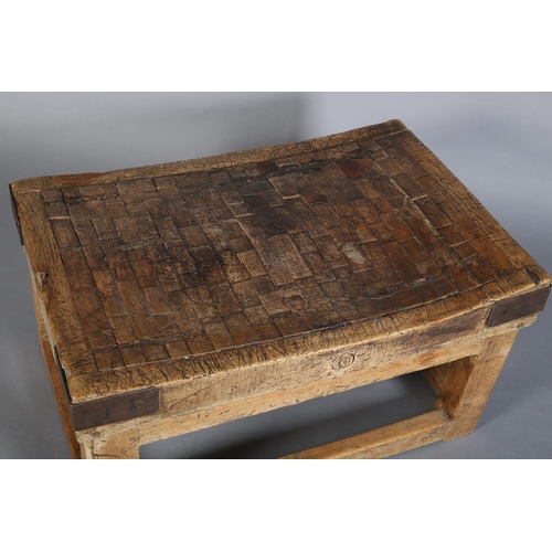 430 - AN OAK BUTCHER'S BLOCK, early 20th century, the square framing now reduced for use as a coffee table... 