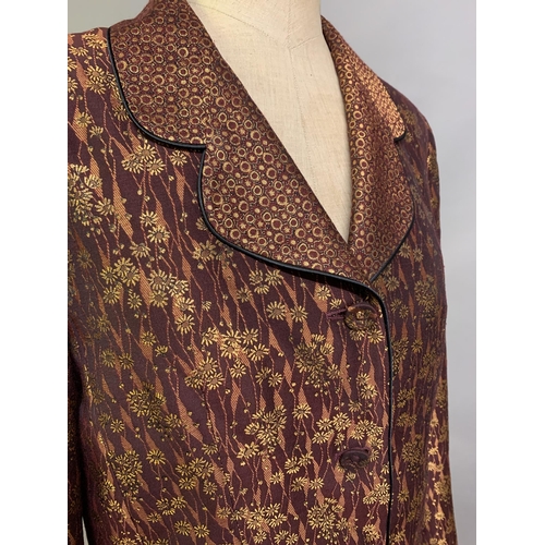 A Caroline Charles Collection evening coat in wine and gold floral brocade,  long sleeves, collar, fa