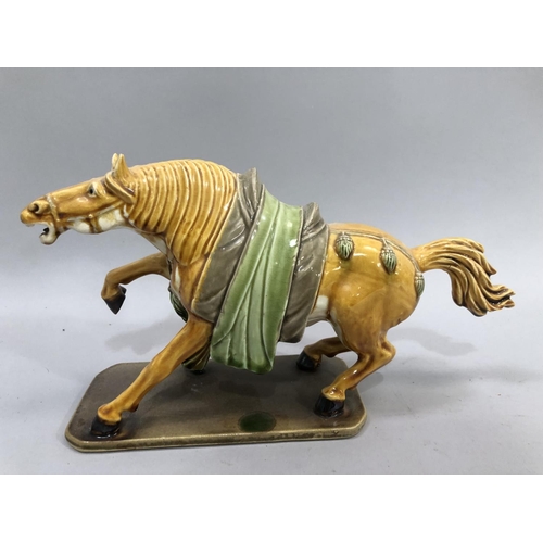 18 - A Chinese pottery Tang Dynasty style horse, rearing on base, 28cm x 16cm