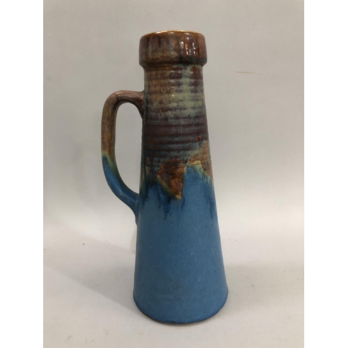 19 - Bourne Denby studio pottery jug of conical form, having a rust and powder blue glaze, signed to the ... 