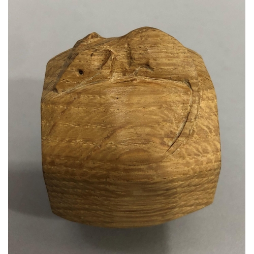 26 - A Thompson of Kilburn 'Mouseman' oak napkin ring carved in high relief with a mouse, 5cm high