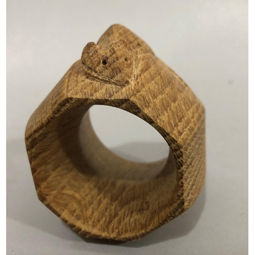 26 - A Thompson of Kilburn 'Mouseman' oak napkin ring carved in high relief with a mouse, 5cm high