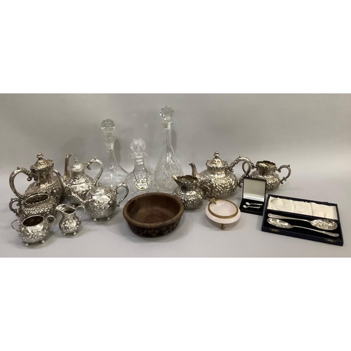 178 - Three cut glass decanters together with silver plated tea and coffee set, moulded with flowers compr... 