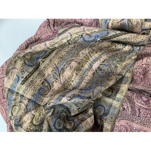 215 - A Paisley shawl woven in pinks, mauve and dark brown, 170cm x 162cm