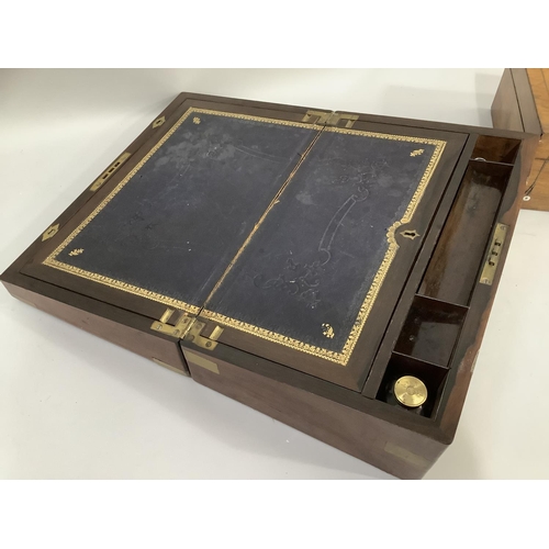 228 - Victorian figured walnut and brass bound writing slope, the interior inlaid with leather, having sta... 