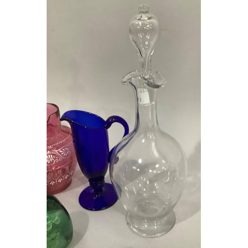 168 - 19th century glassware comprising two decanters with frilled rims, cranberry jug with white applied ... 