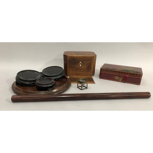 137 - A 19th century mahogany rule, oak tea caddy with bone escutcheon, chinoiserie lacquered bridge set, ... 