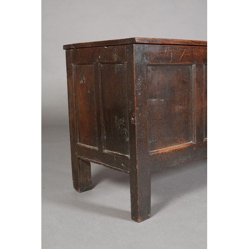 66 - An Early 18th century oak kist having a triple indented top above a frieze carved with the initials ... 