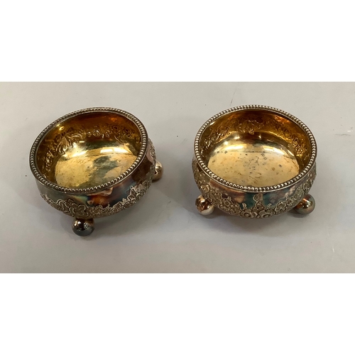 295 - A pair of Victorian silver salts, Sheffield 1873 for Martin, Hall and Co of circular outline with fo... 