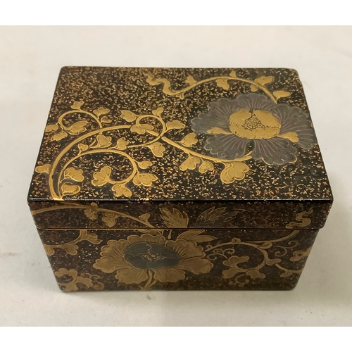 50 - A Japanese bronze napkin ring incised and applied in yellow metal with frog and egret amongst willow... 