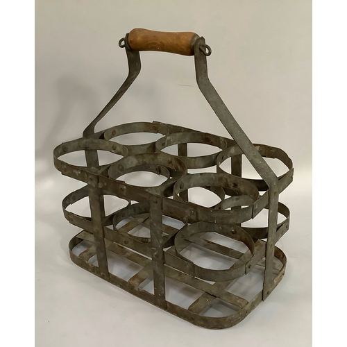 208 - A vintage six bottle carrier, steel strapwork with wooden handle
32cm x 21cm x 34cm over handle, eac... 