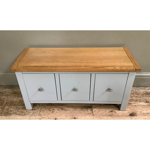 125 - A modern set of three grey deep drawers with chrome handles with solid wood top, 90cm wide