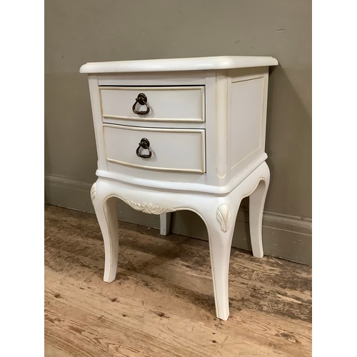 234 - A modern white bedside cabinet having two drawers on cabriole legs