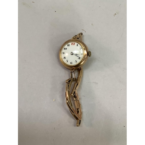 323 - A George V ladies wrist watch in 9ct gold case on a later expanding 9ct gold bracelet