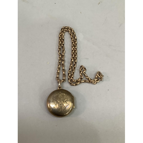 333 - An Edward VII locket in 9ct gold, front and back monogrammed SW and date to the reverse 27th August ... 