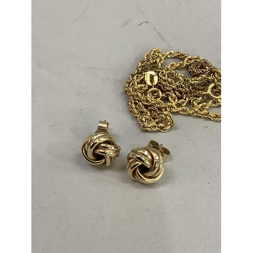 338 - A pair of knot earrings in 9ct gold together with a rope link chain in 9ct gold (at fault), total ap... 