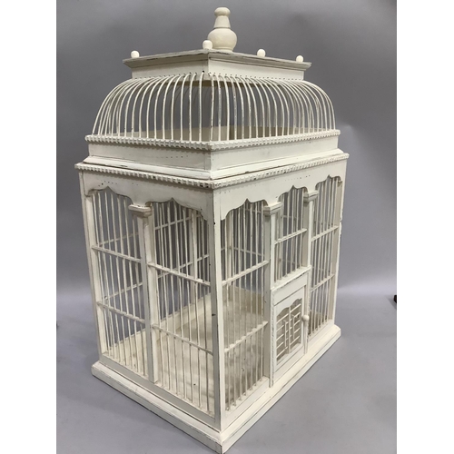 244 - A cream painted ornamental birdcage with pagoda top, 45cm wide, 70cm high, 36cm deep