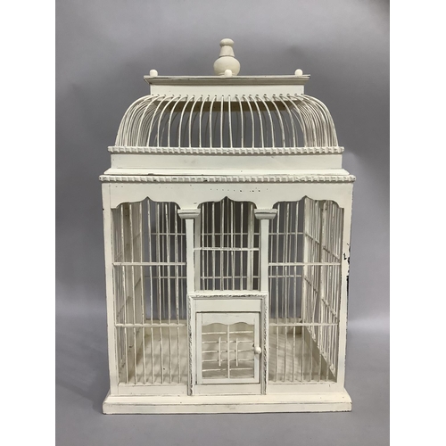 244 - A cream painted ornamental birdcage with pagoda top, 45cm wide, 70cm high, 36cm deep