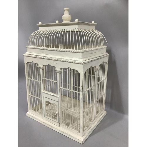 244 - A cream painted ornamental birdcage with pagoda top, 45cm wide, 70cm high, 36cm deep