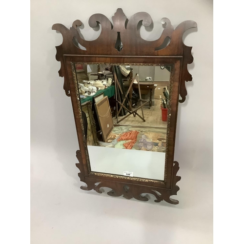 249 - A mid 18th century style mahogany wall mirror with gilt slip and fret cut cresting and apron, early ... 